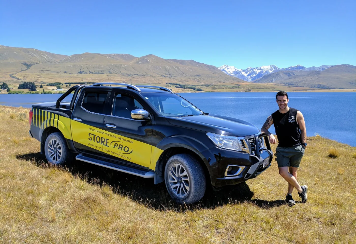 Tim with the StorePro truck by a South Island lake
